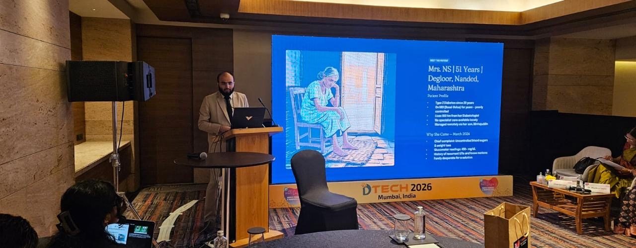 Dr. Khizer Hussain Junaidy presenting a real-world patient case as invited faculty at DTech 2026, Grand Hyatt Mumbai.