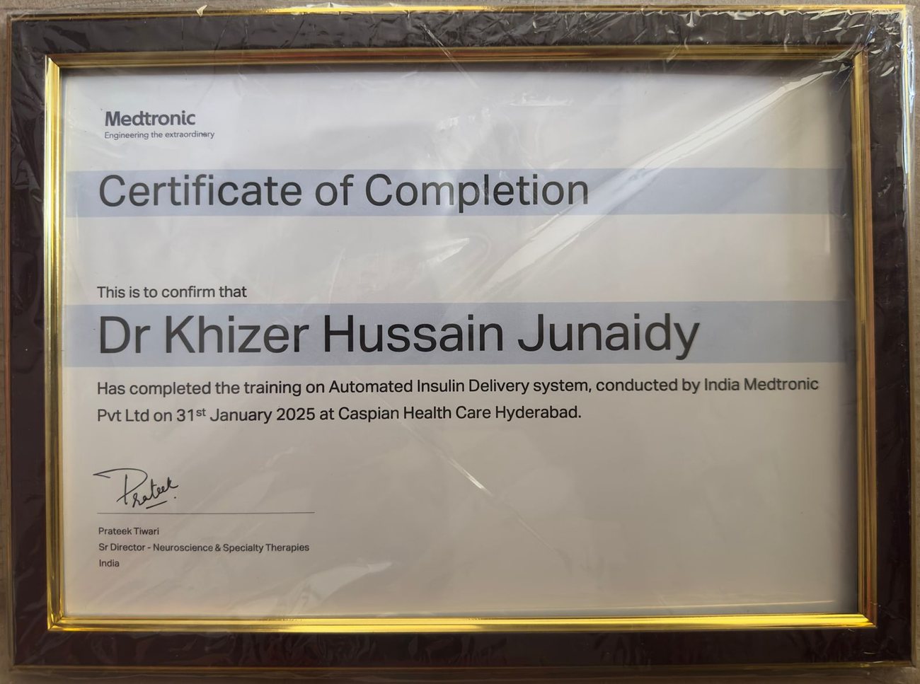 Medtronic Certificate of Completion confirming Dr Khizer Hussain Junaidy completed training on the Automated Insulin Delivery system, conducted by India Medtronic Pvt Ltd on 31 January 2025 at Caspian Health Care Hyderabad.